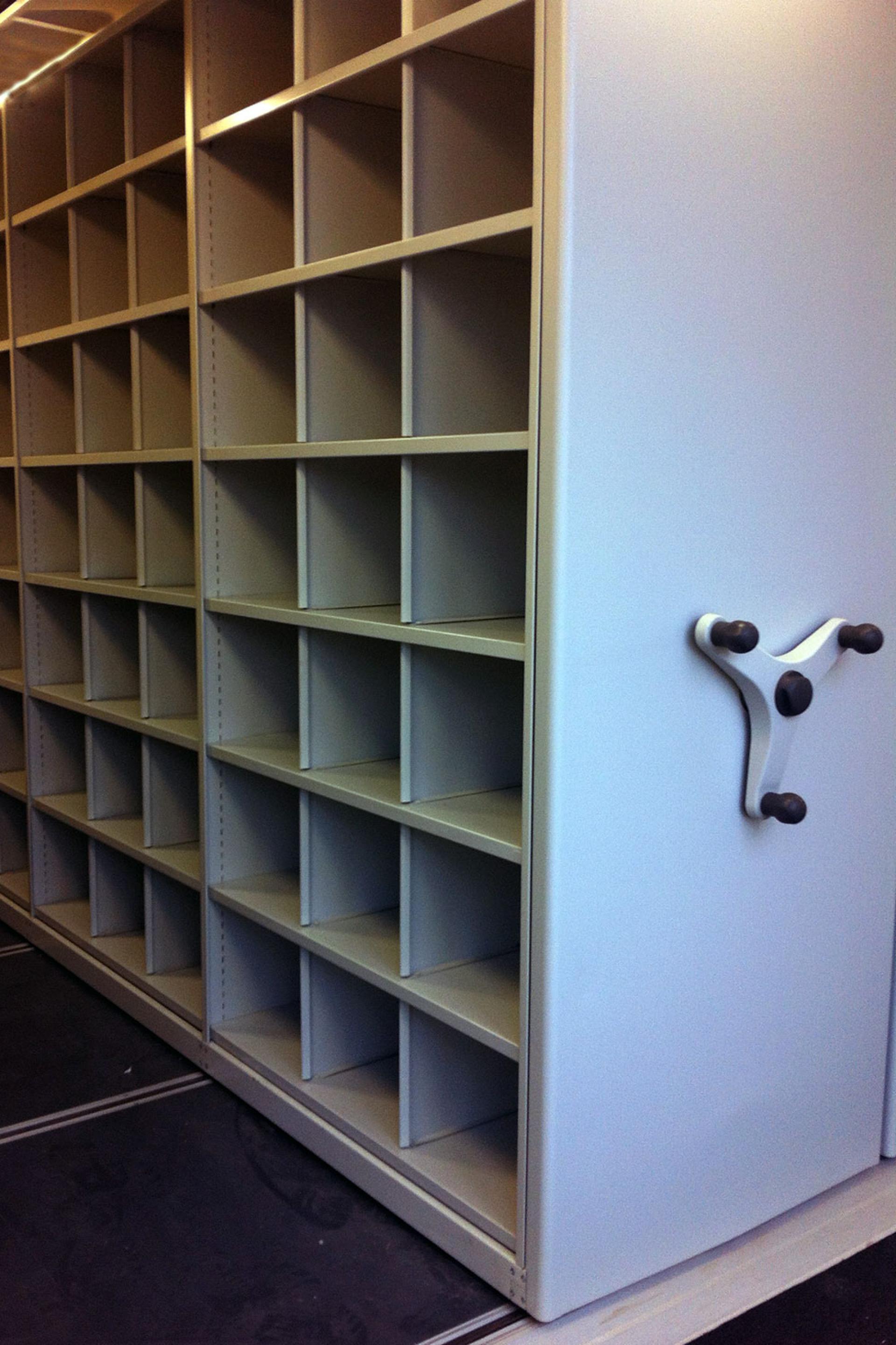 Mobile storage with bays divided into 3