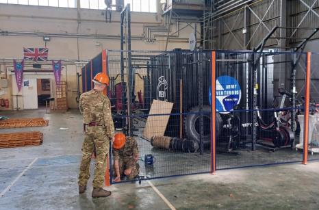 Supplied in regimental colours, the army secured the area with mesh partitioning