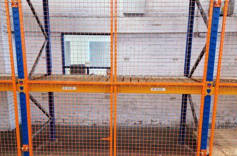 Bolt-on sturdy mesh doors to pallet racking
