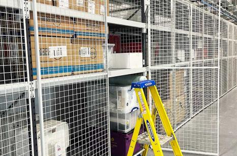 Full height lockable mesh doors on shelving